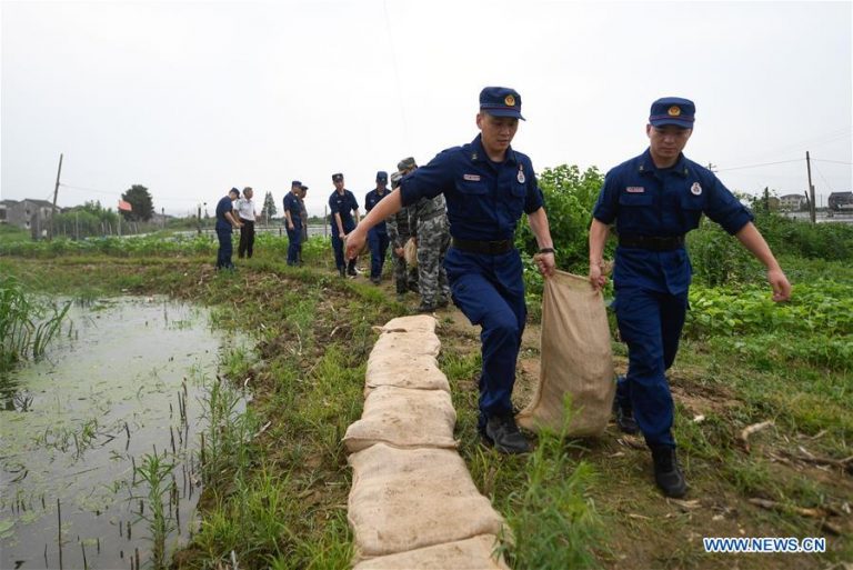China raises emergency response level as flooding continues